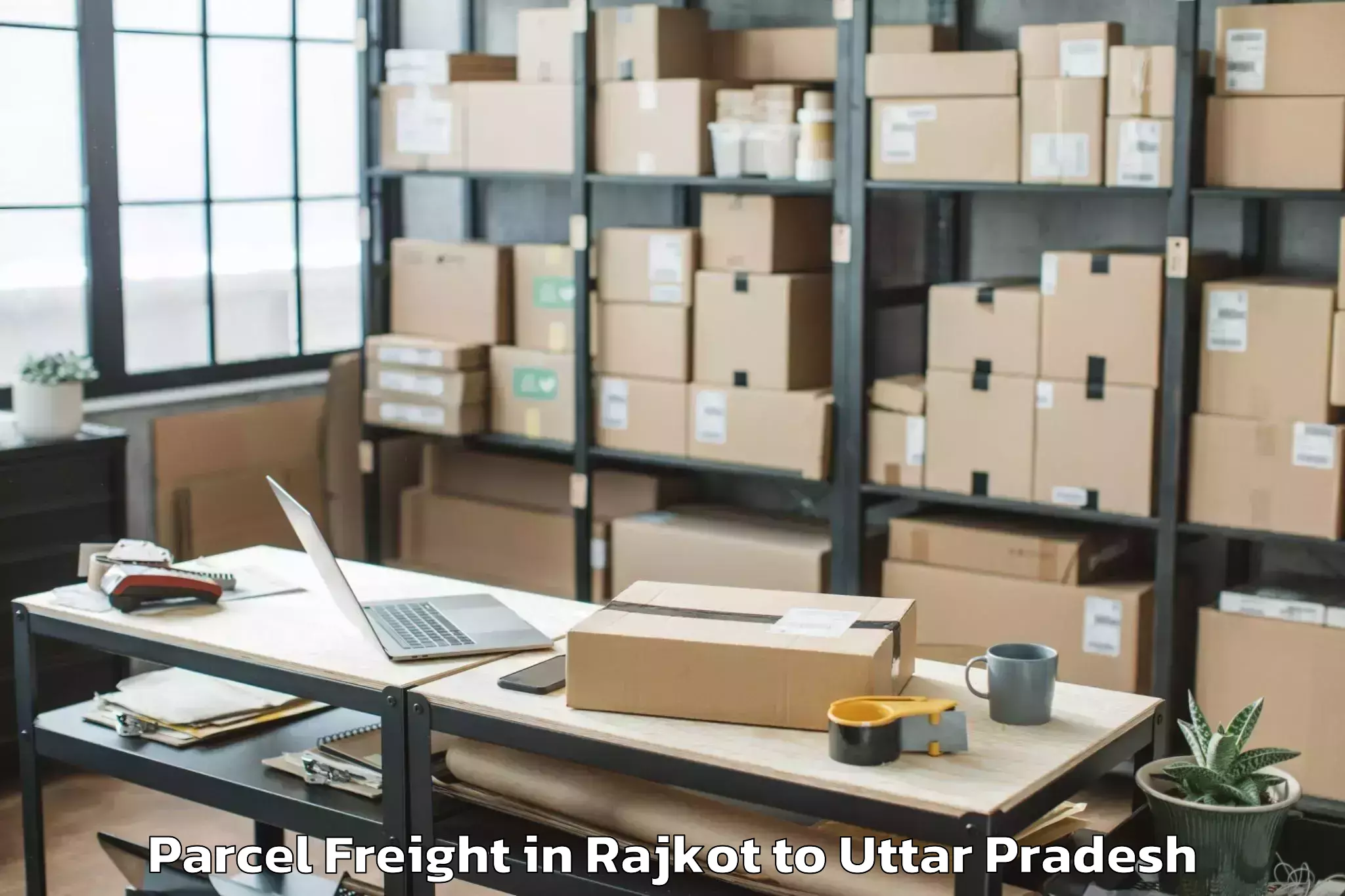 Discover Rajkot to Bisauli Parcel Freight